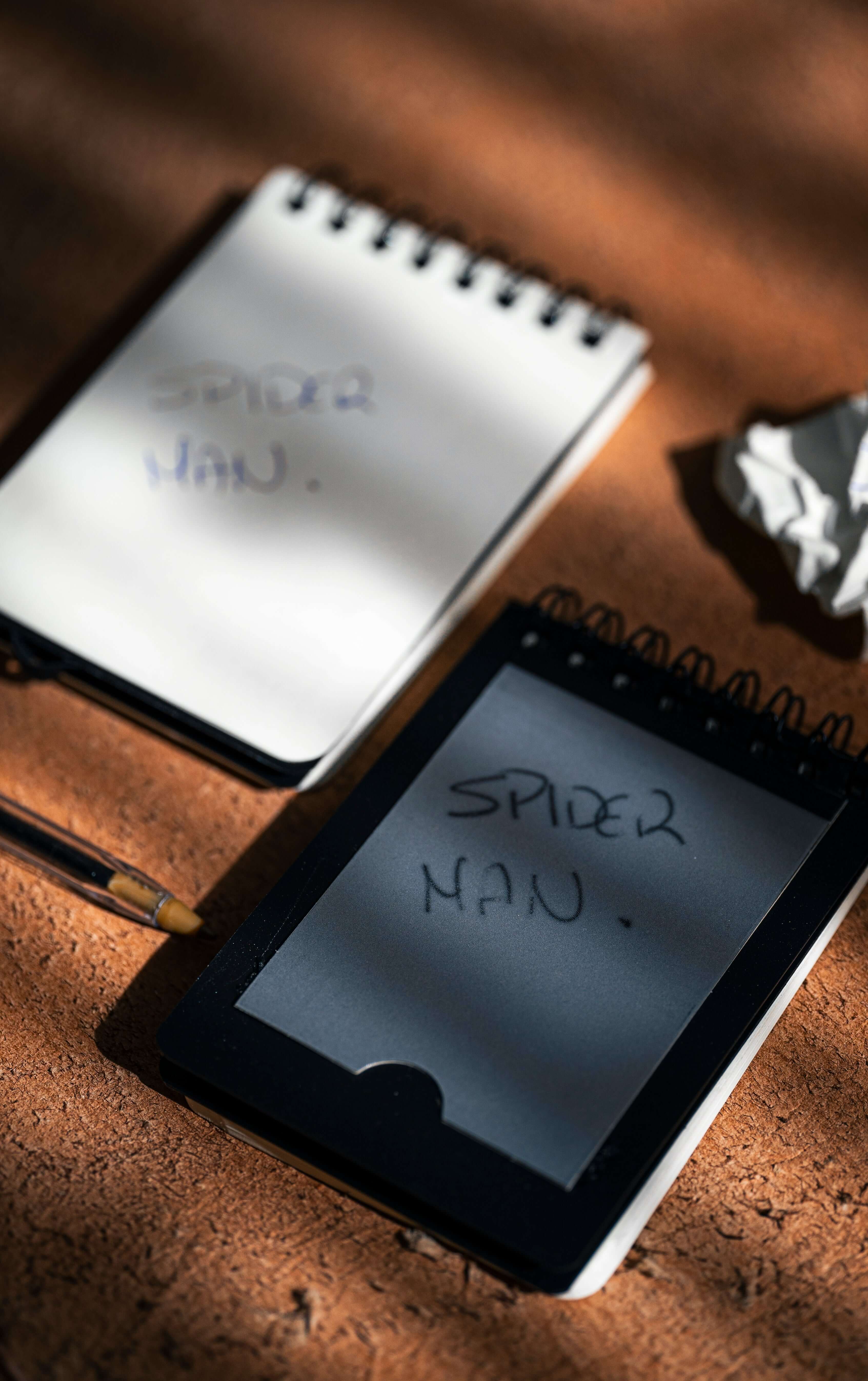 REPLICA: Pocket-size Impression Pad with handwritten notes and a pen.