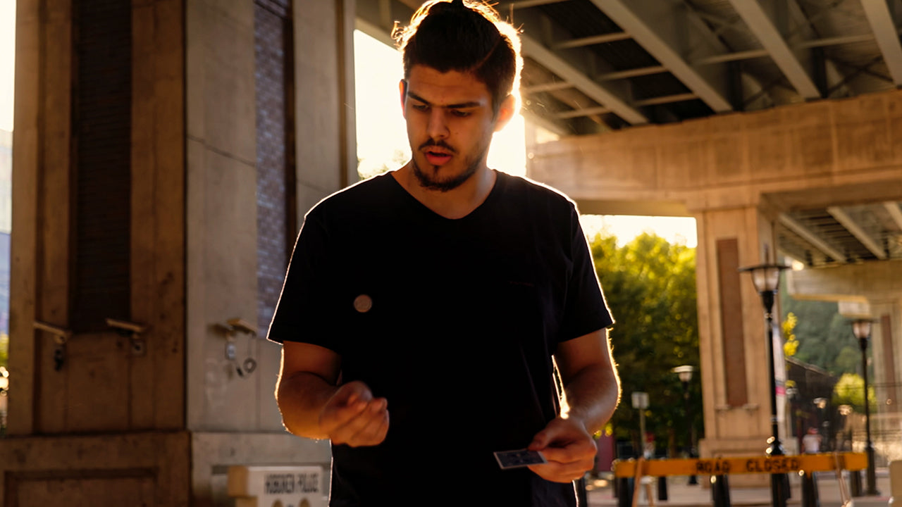 Lava: Coin Through Card Gaff by Antonio Bourgeois | Ellusionist